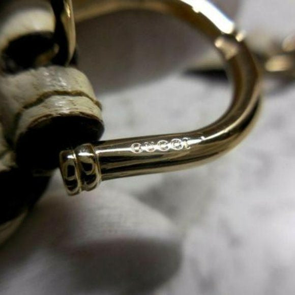 Amazing, Gucci Gold Tone Chain with a Yellow & White Striped Ribbon Woven Throughout with White Leather