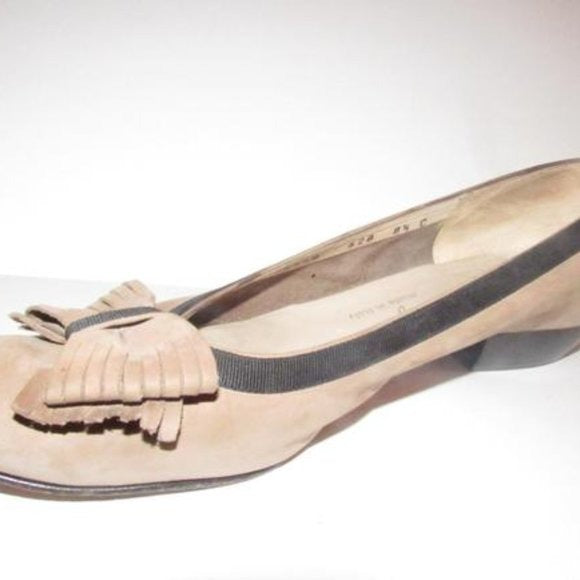 Salvatore Ferragamo VARA brown suede flats with black trim, large, fringe bows at the toes, and low, wedge heels