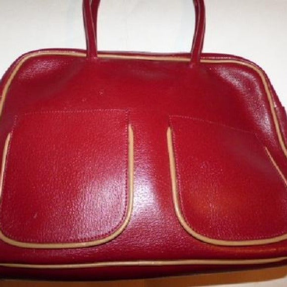 Vintage Furla deep red leather satchel style purse with tan piping, two handles, & two front pockets
