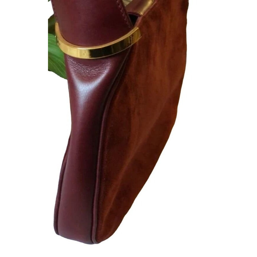 Rare, vintage, Gucci, burgundy leather & suede, unique, 1961 Jackie, hobo style shoulder bag with a two-tone piston closure & flap top