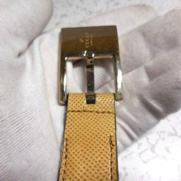 Gucci tan lizard leather belt w engraved chrome buckle