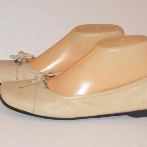 Prada Pink Beige Leather Ballet Flats with an Almond Toe and Bow with Chrome Accents