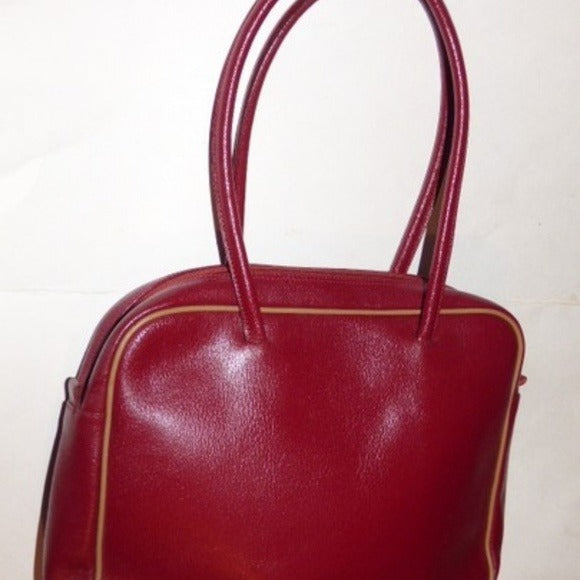 Vintage Furla deep red leather satchel style purse with tan piping, two handles, & two front pockets
