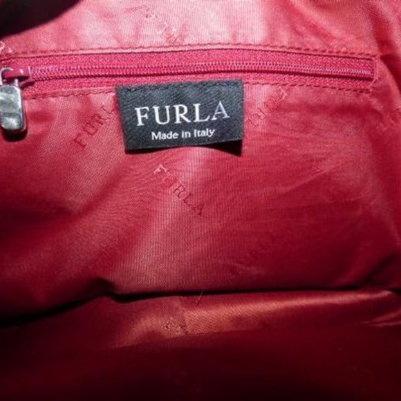 Vintage Furla deep red leather satchel style purse with tan piping, two handles, & two front pockets