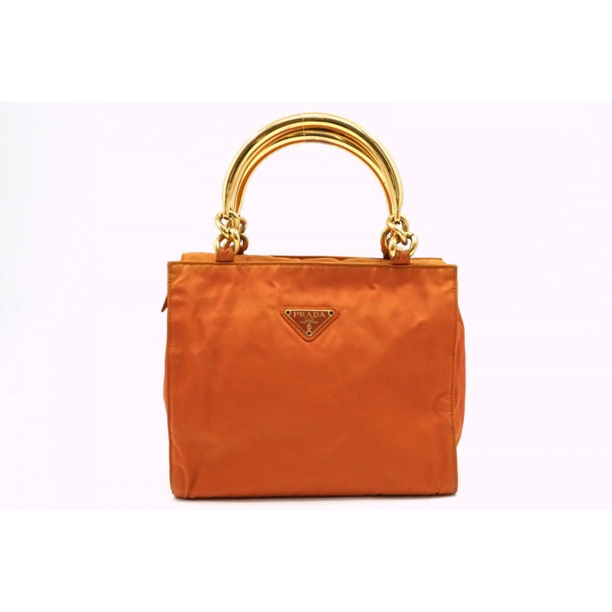 Prada orange re-edition 2000 satchel with gold metal handles