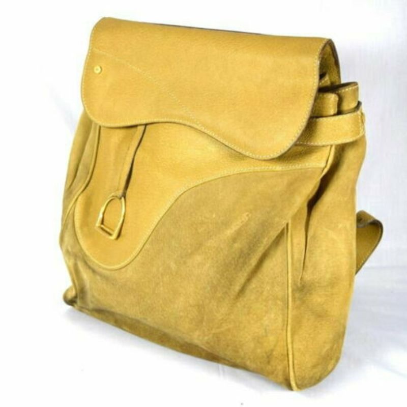 RARE, Gucci, Stirrup style camel suede and leather saddle bag top backpack or messenger bag with a gold stirrup accent