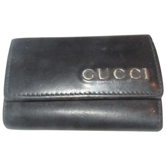 Gucci, black leather, snap close, tri-fold, key holder/card holder, mini- wallet w chrome accents & slots for your cards & six key holders