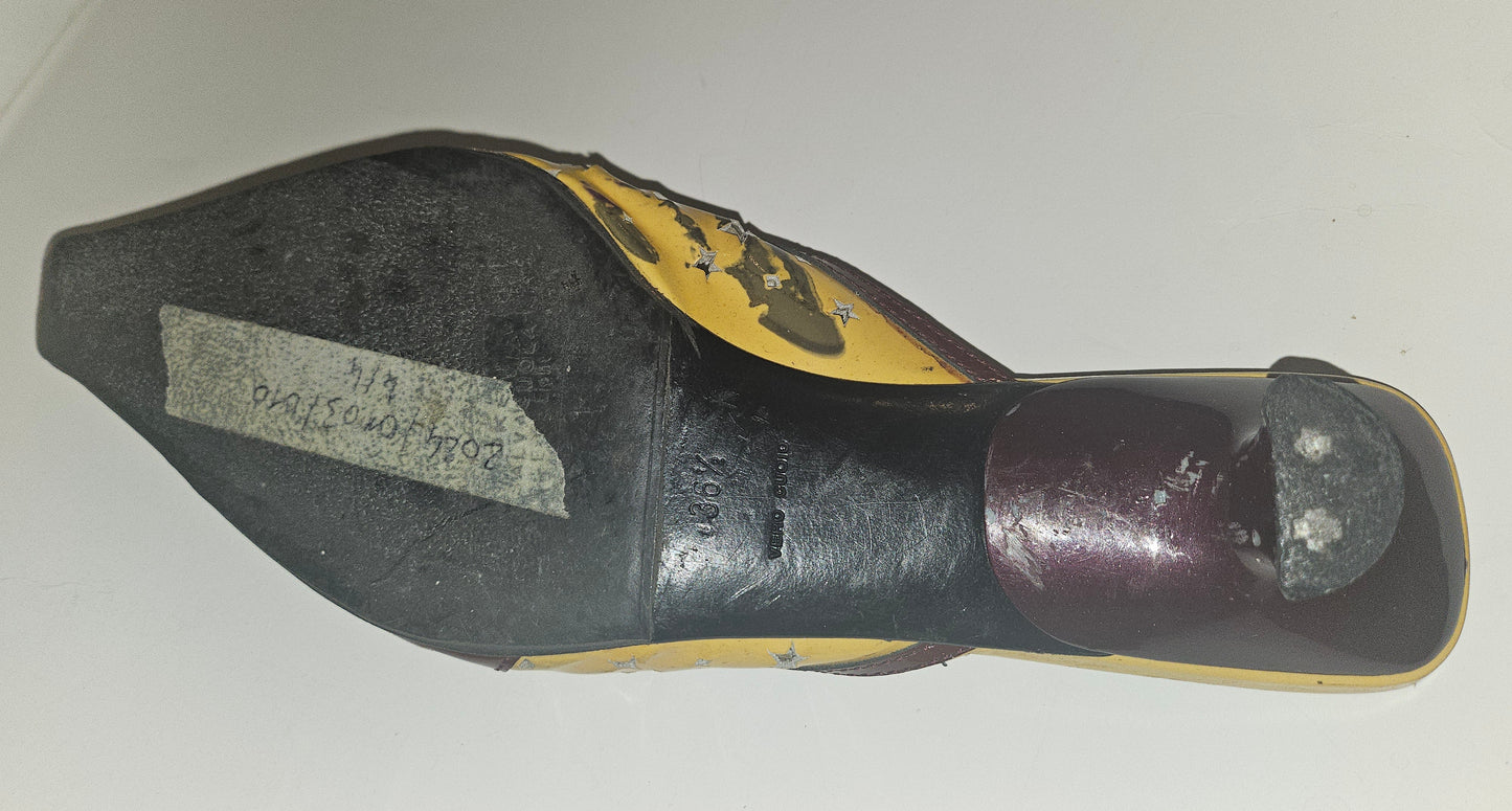 Prada kitten heel mules in yellow, brown, & dark red with star cut outs