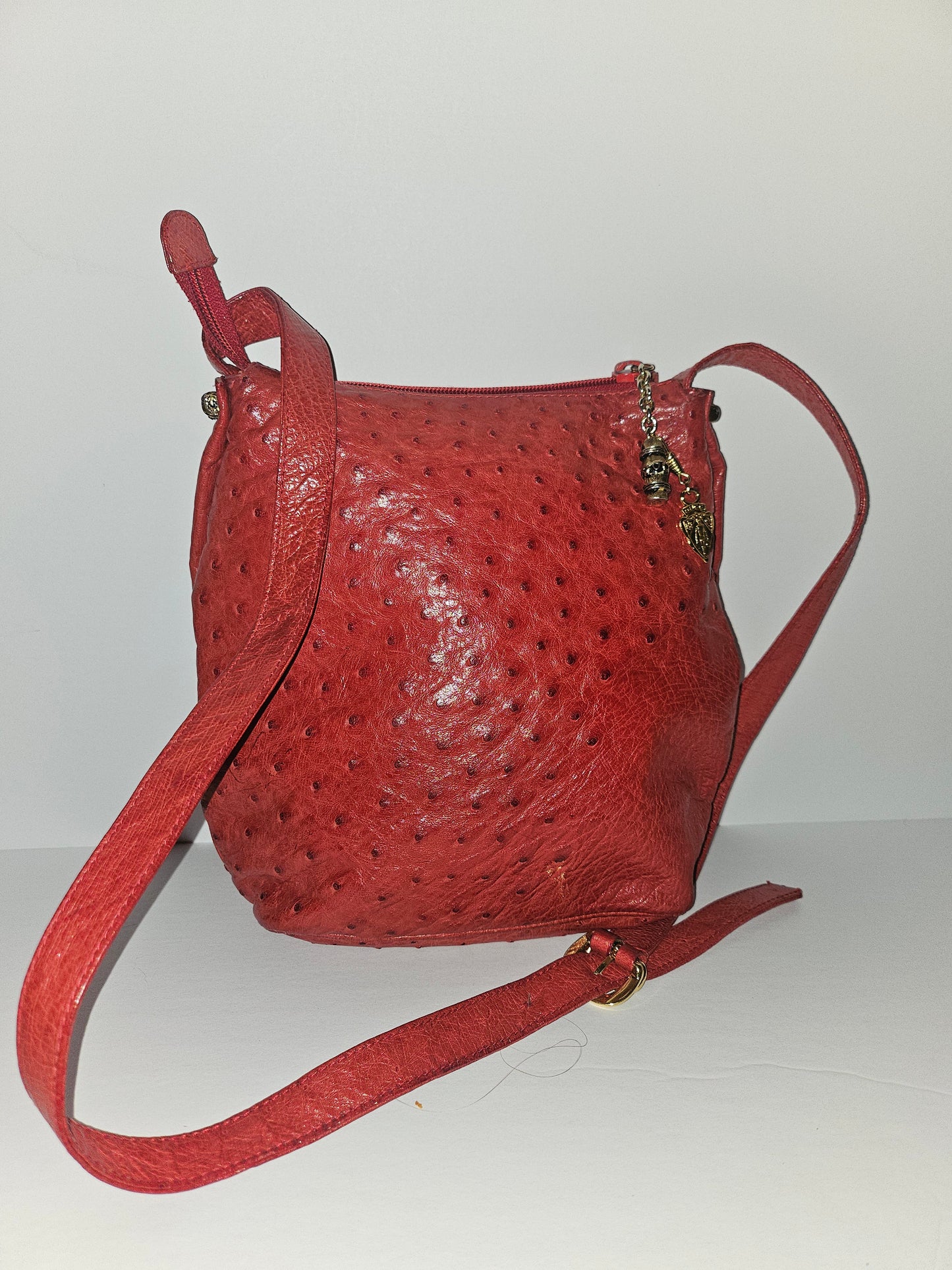 Gucci red ostrich leather cross body bucket bag