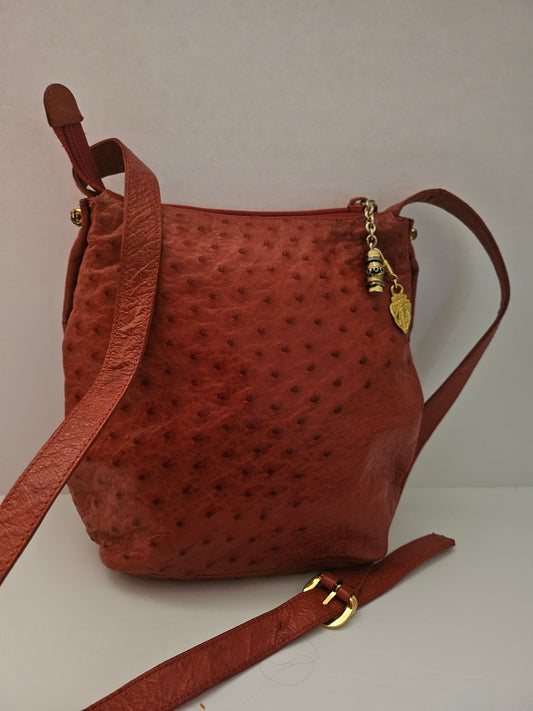 Gucci red ostrich leather cross body bucket bag