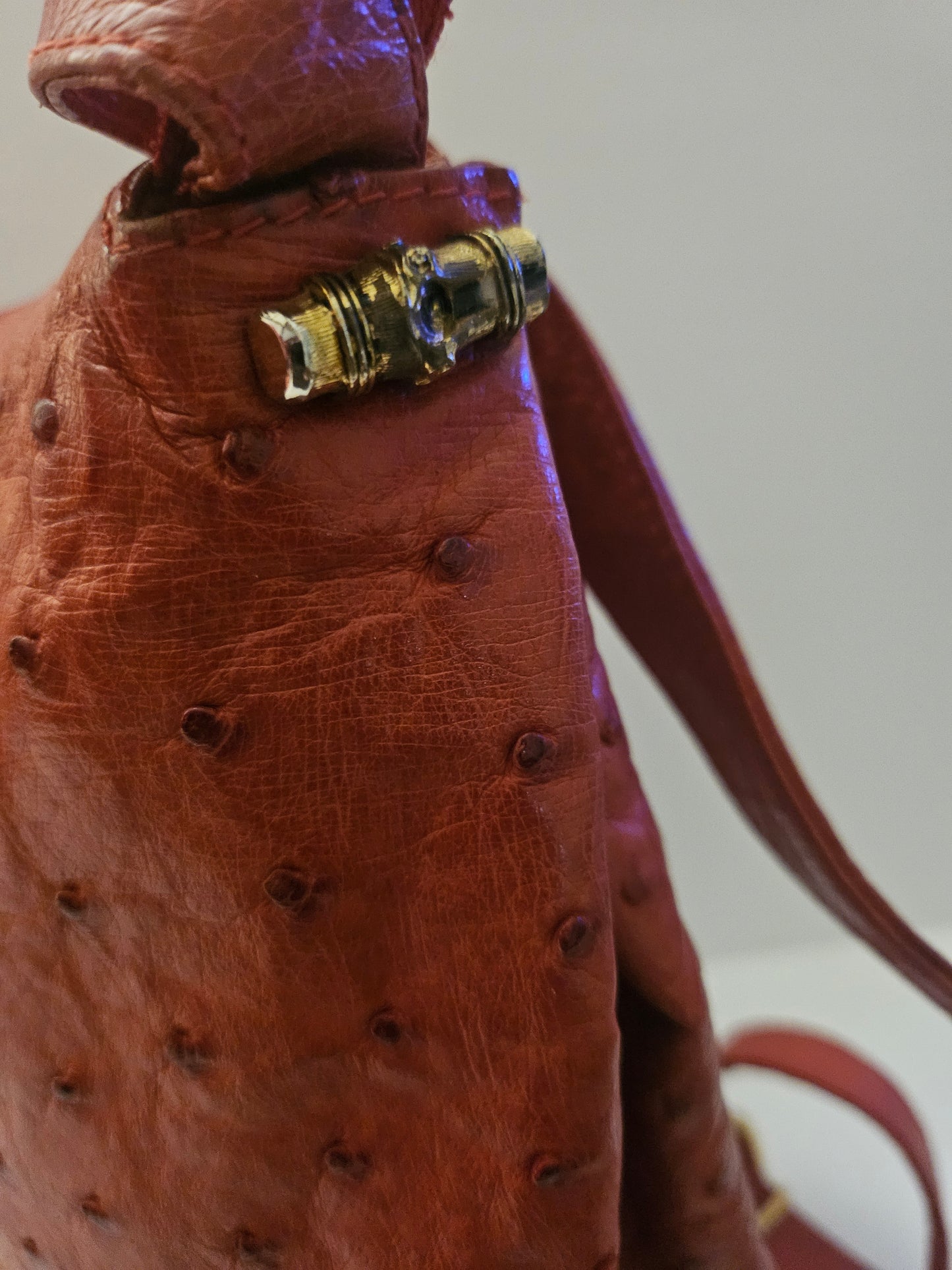 Gucci red ostrich leather cross body bucket bag