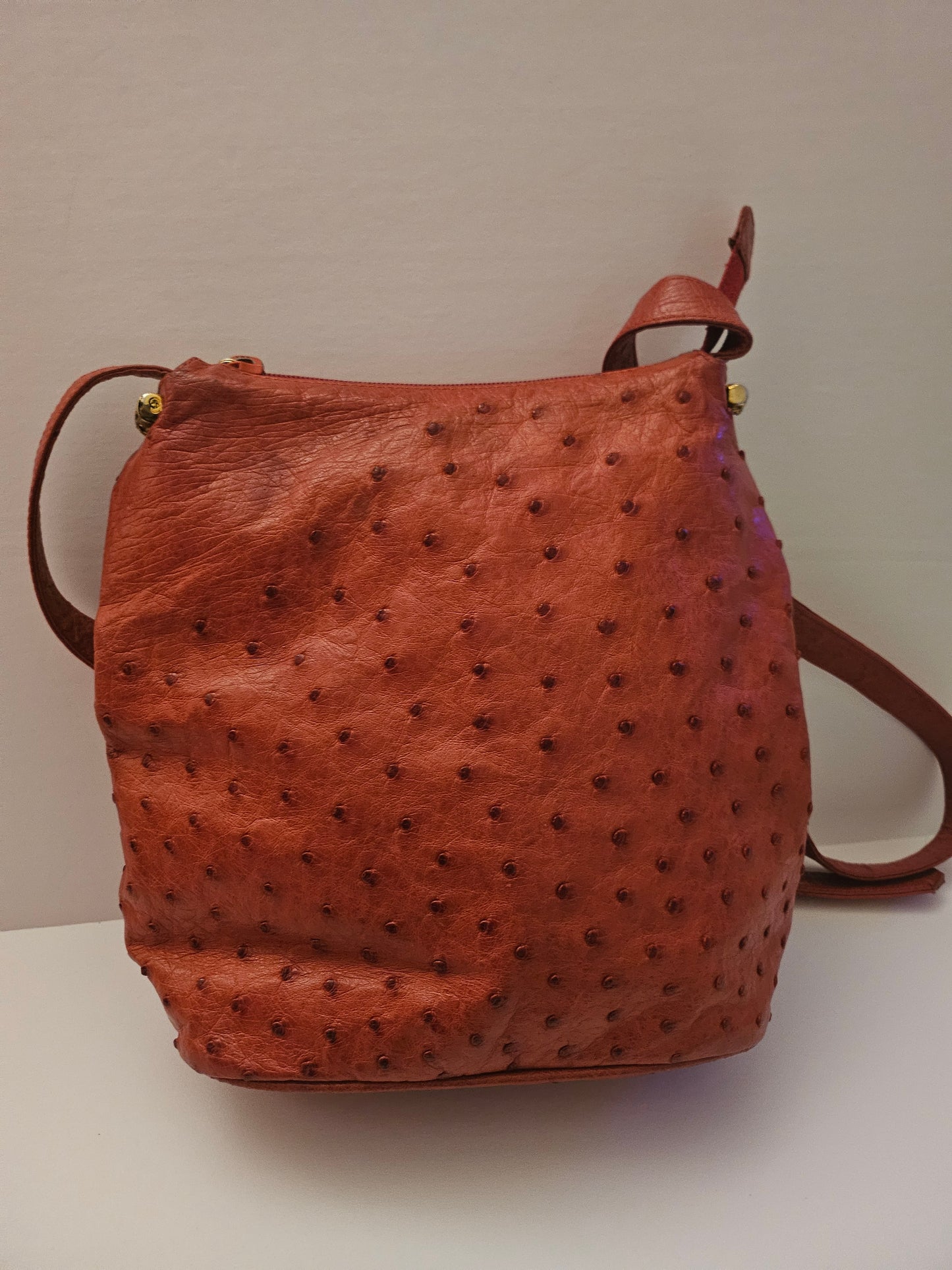 Gucci red ostrich leather cross body bucket bag