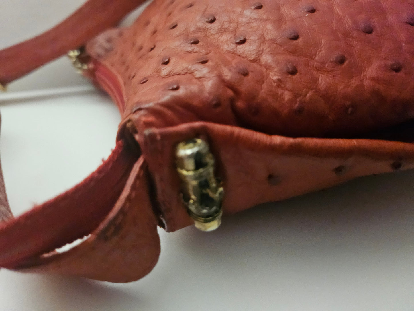 Gucci red ostrich leather cross body bucket bag