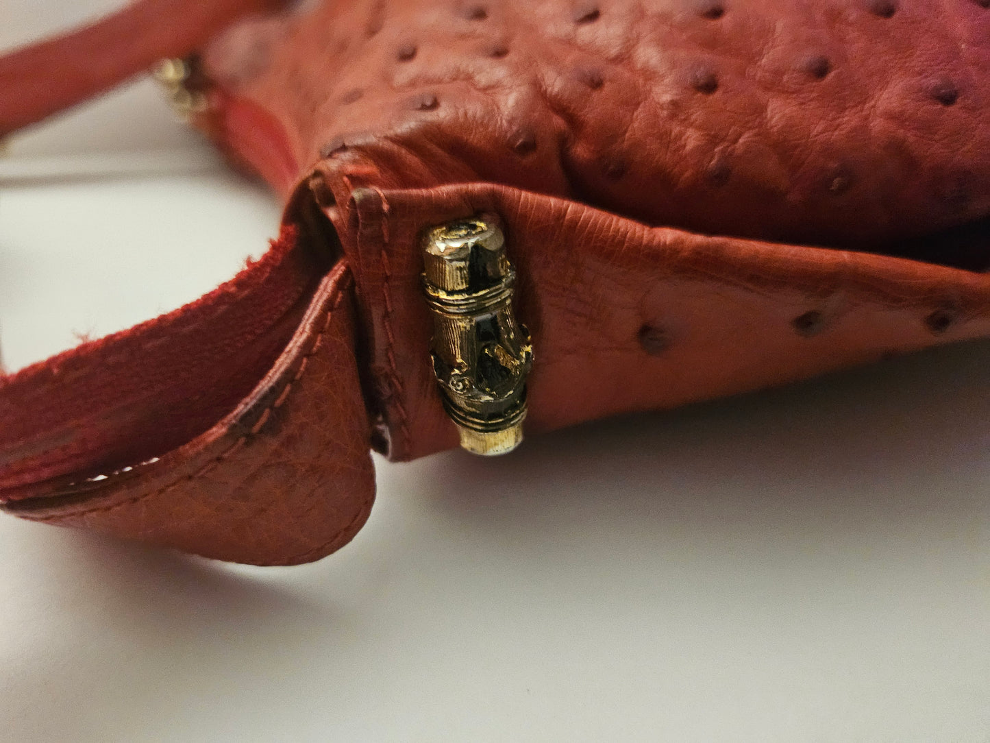 Gucci red ostrich leather cross body bucket bag
