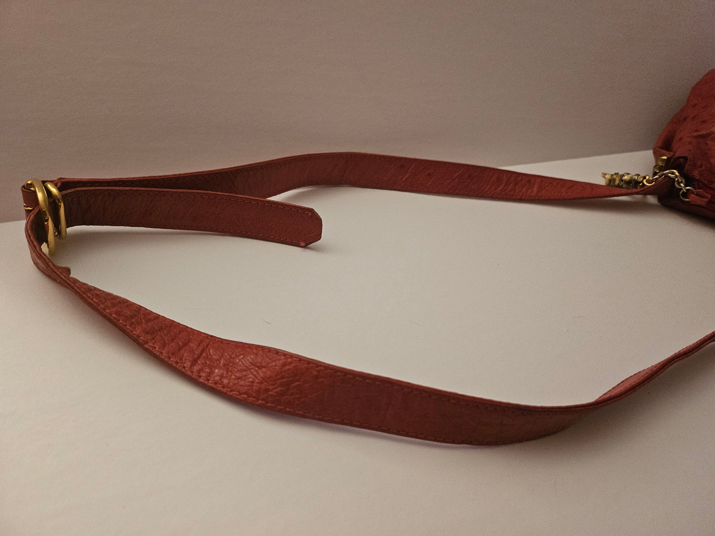 Gucci red ostrich leather cross body bucket bag