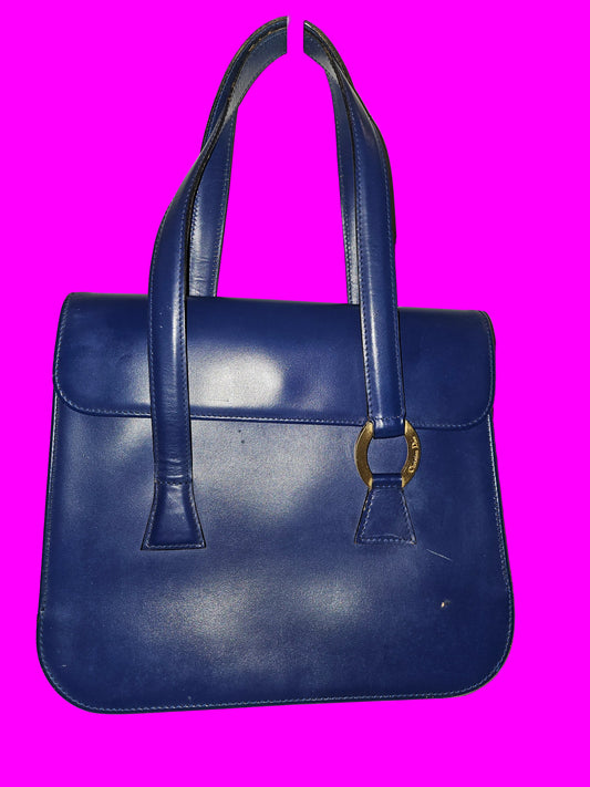 Dior cobalt blue leather satchel with gold engraved hardware.