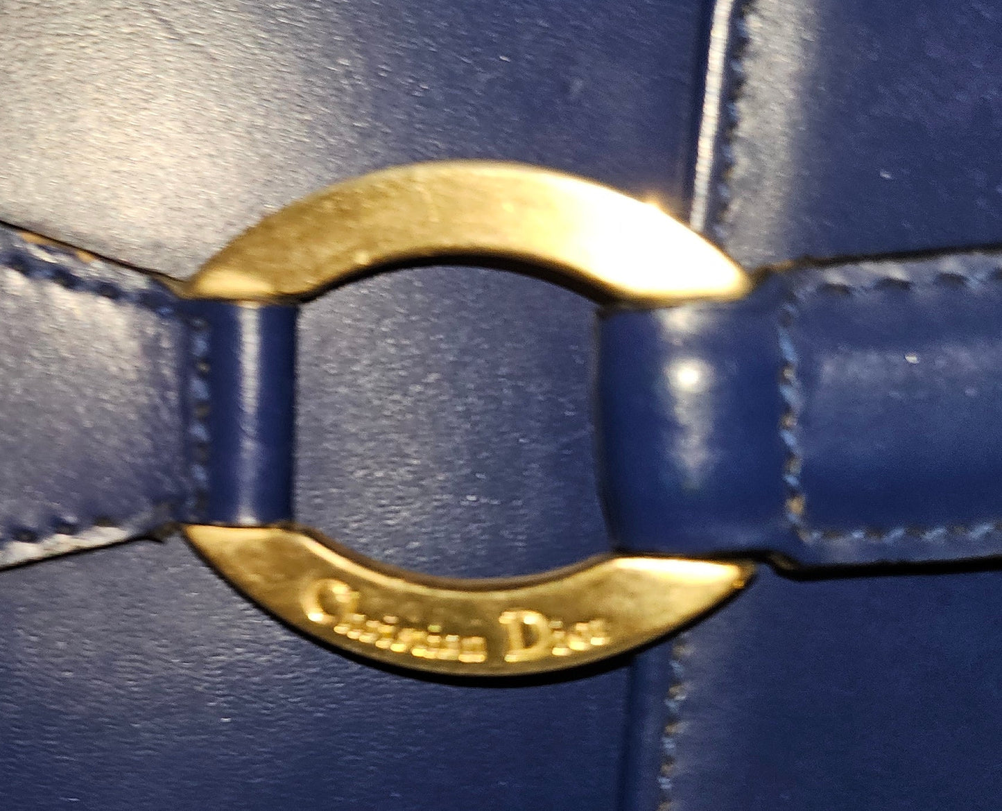 Dior cobalt blue leather satchel with gold engraved hardware.