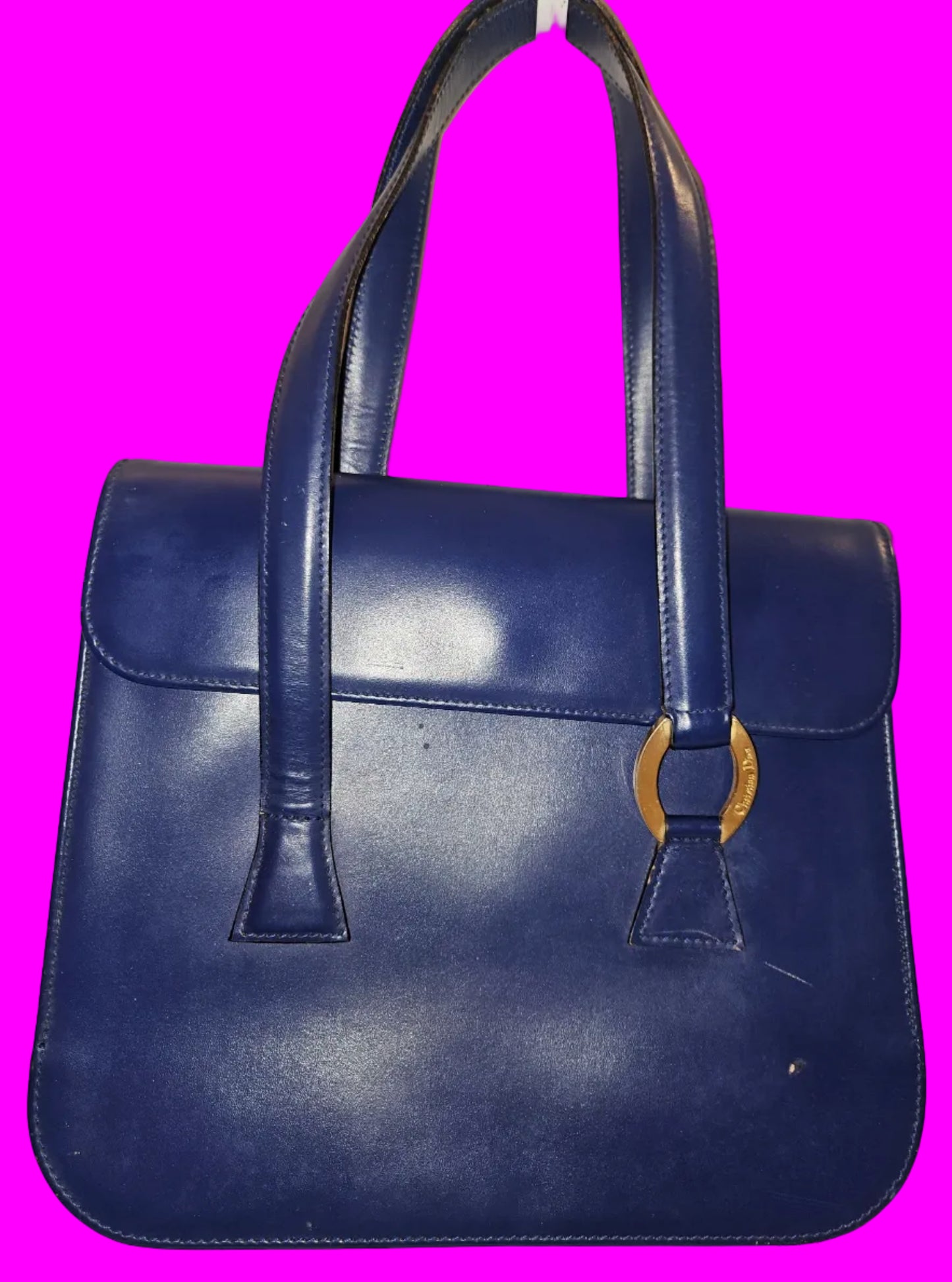 Dior cobalt blue leather satchel with gold engraved hardware.