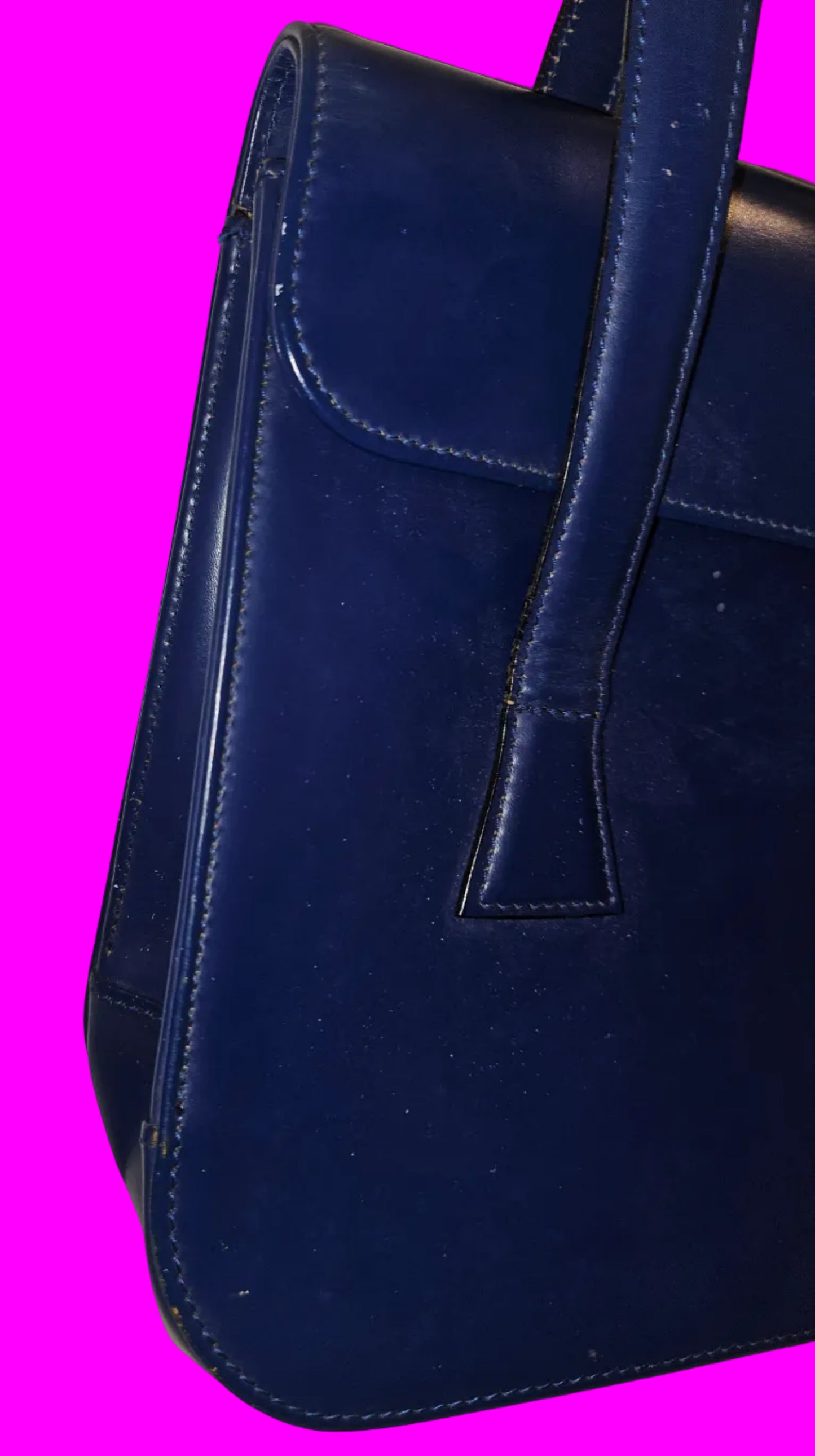 Dior cobalt blue leather satchel with gold engraved hardware.