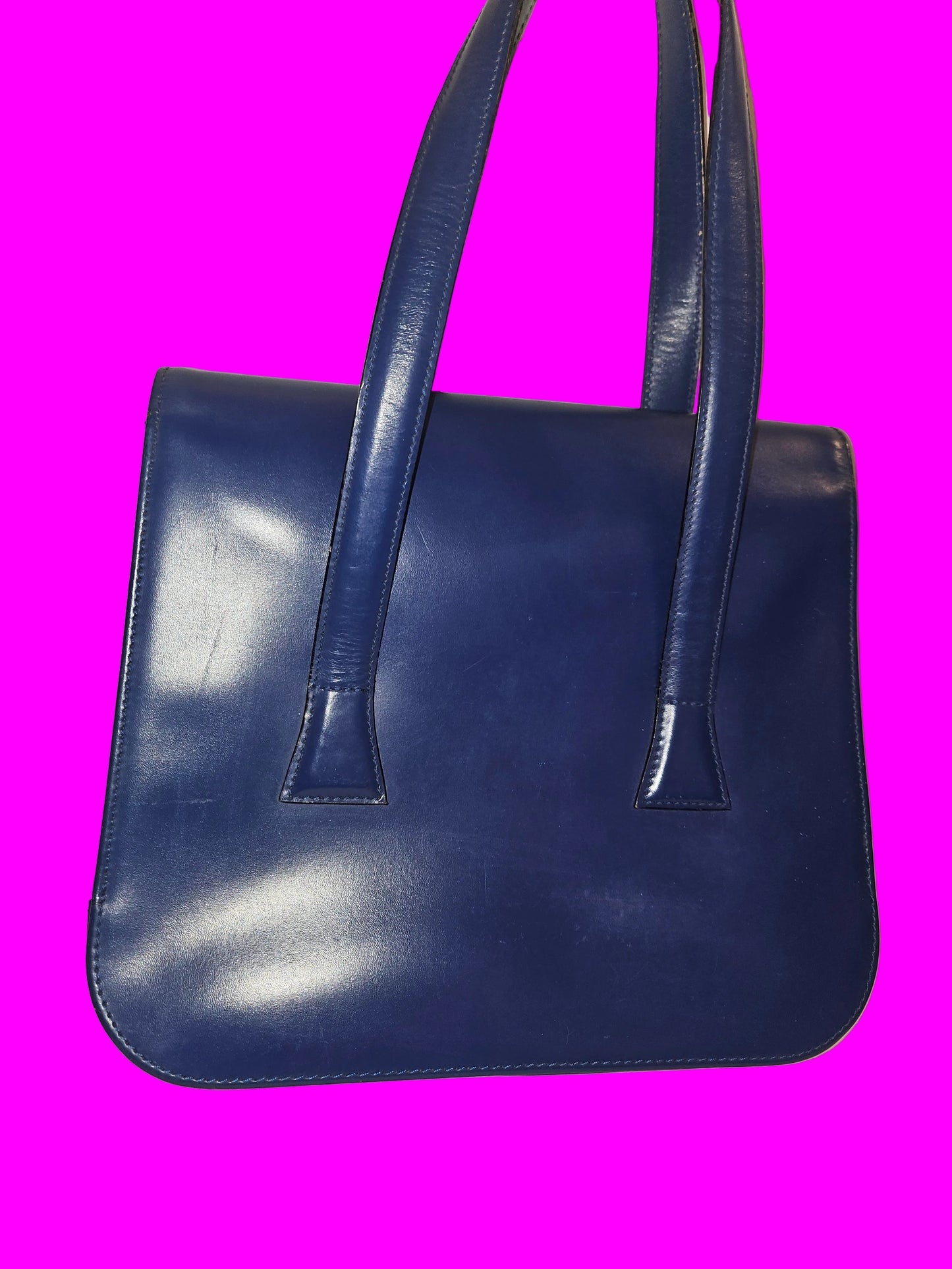 Dior cobalt blue leather satchel with gold engraved hardware.