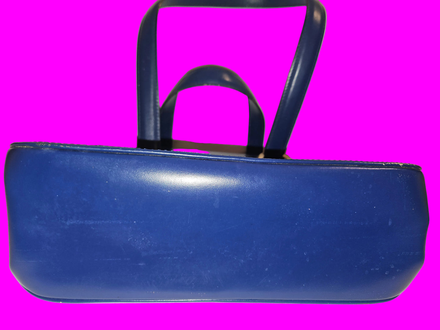 Dior cobalt blue leather satchel with gold engraved hardware.