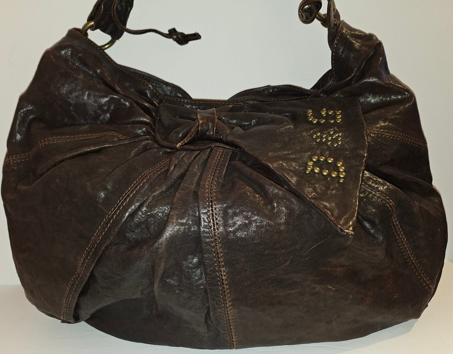 Dolce & Gabbana brown leather XL hobo with a bow & brass studs