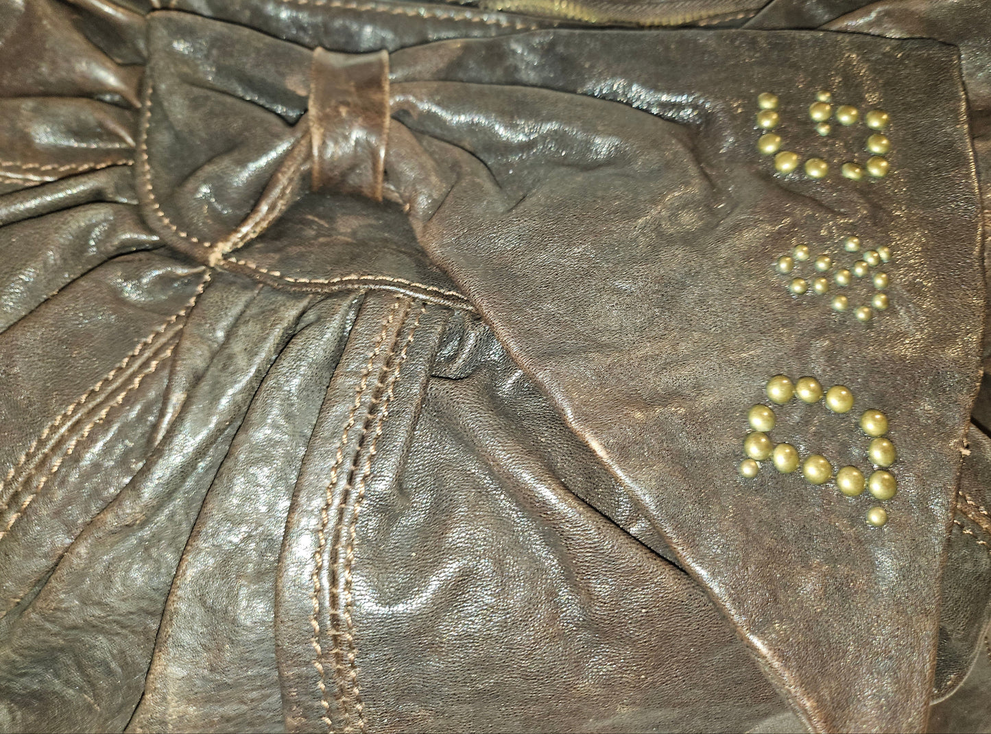 Dolce & Gabbana brown leather XL hobo with a bow & brass studs