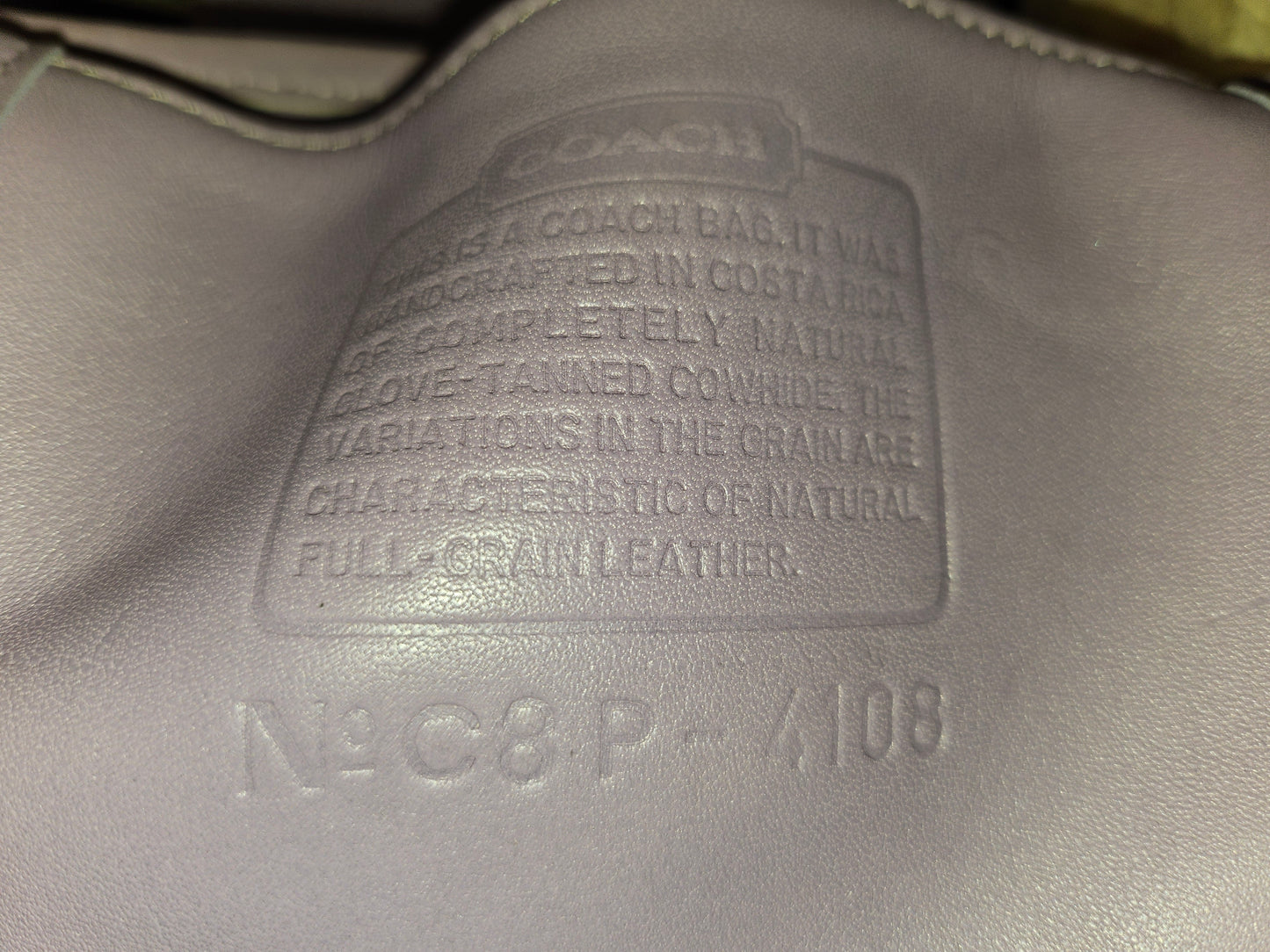 Coach lavender purple, petite, leather crossbody bag with chrome hardware