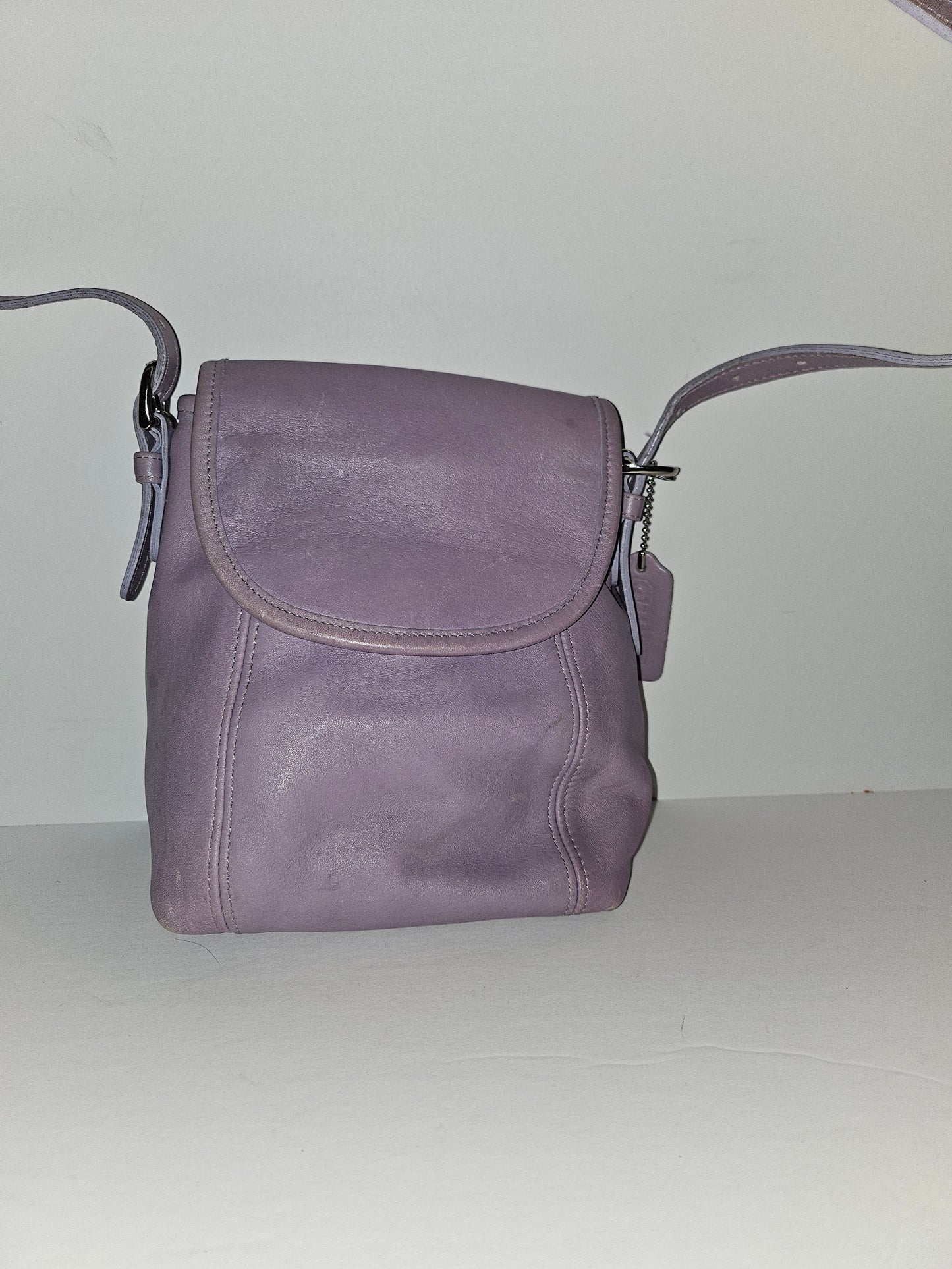 Coach lavender purple, petite, leather crossbody bag with chrome hardware
