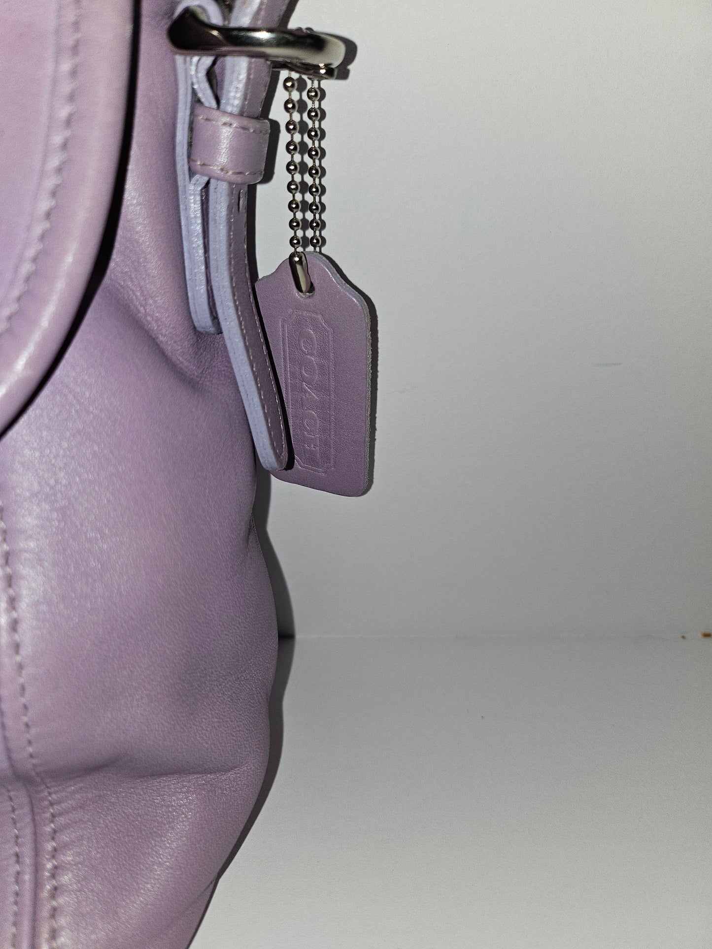 Coach lavender purple, petite, leather crossbody bag with chrome hardware