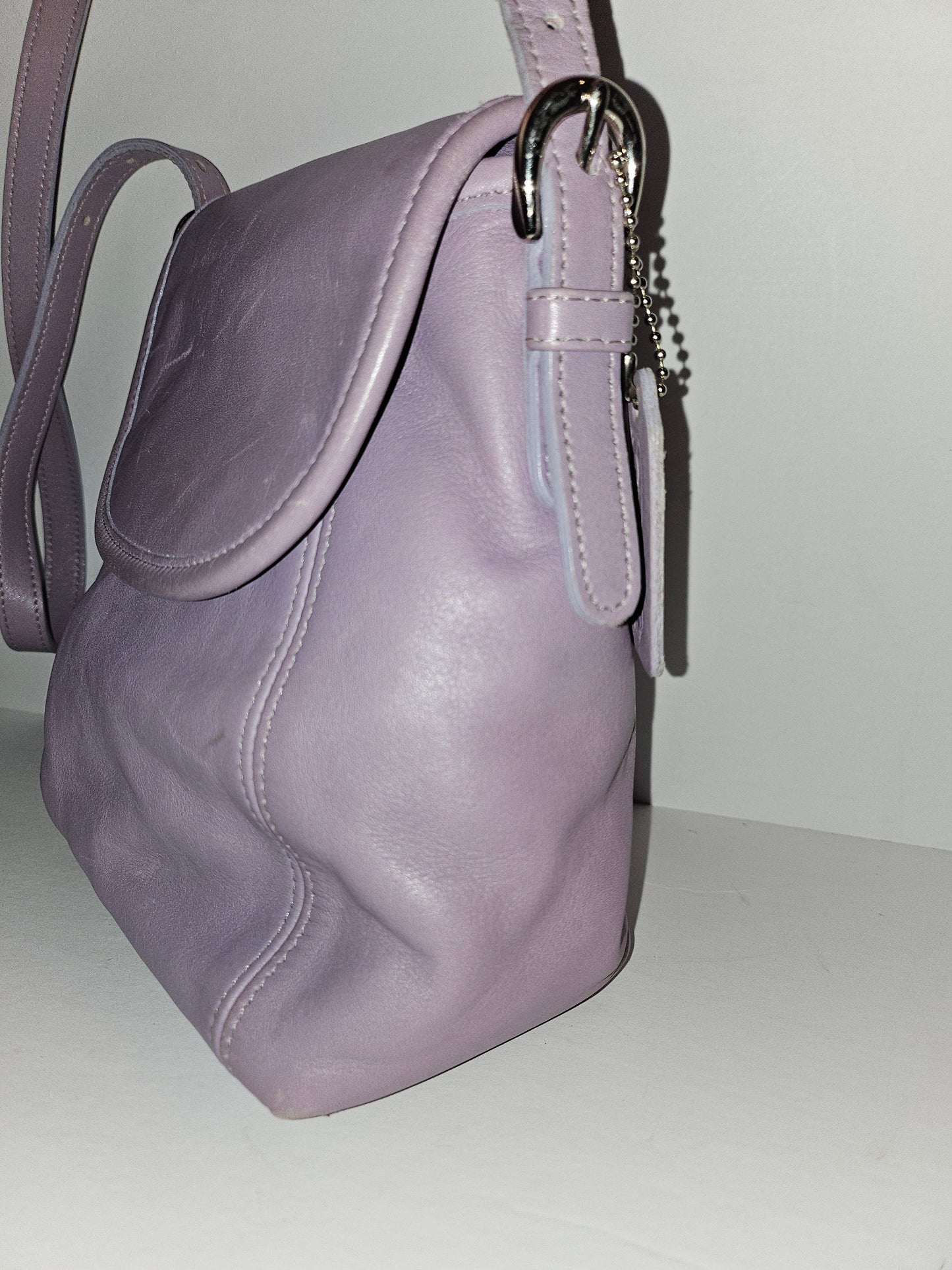 Coach lavender purple, petite, leather crossbody bag with chrome hardware