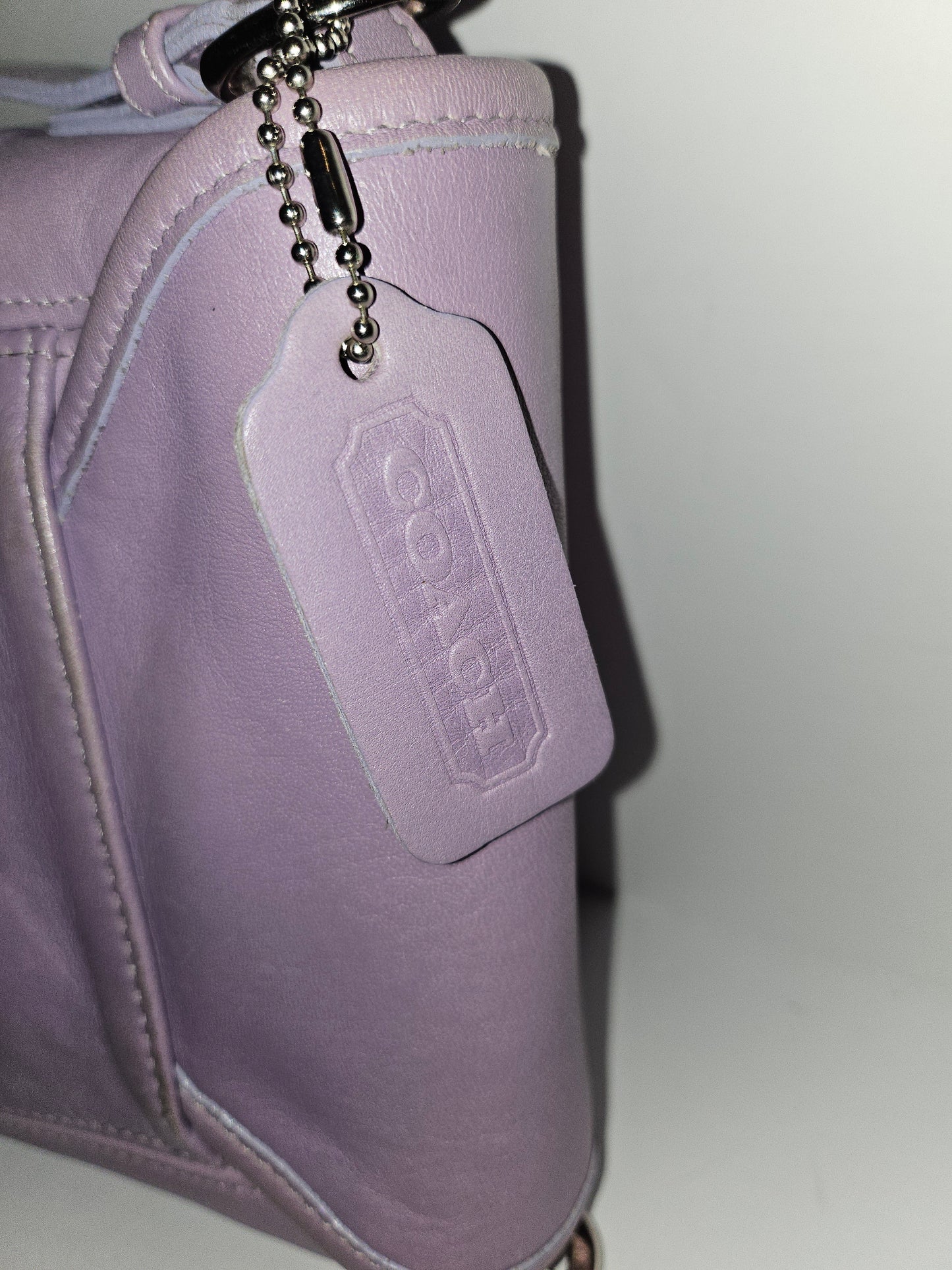 Coach lavender purple, petite, leather crossbody bag with chrome hardware
