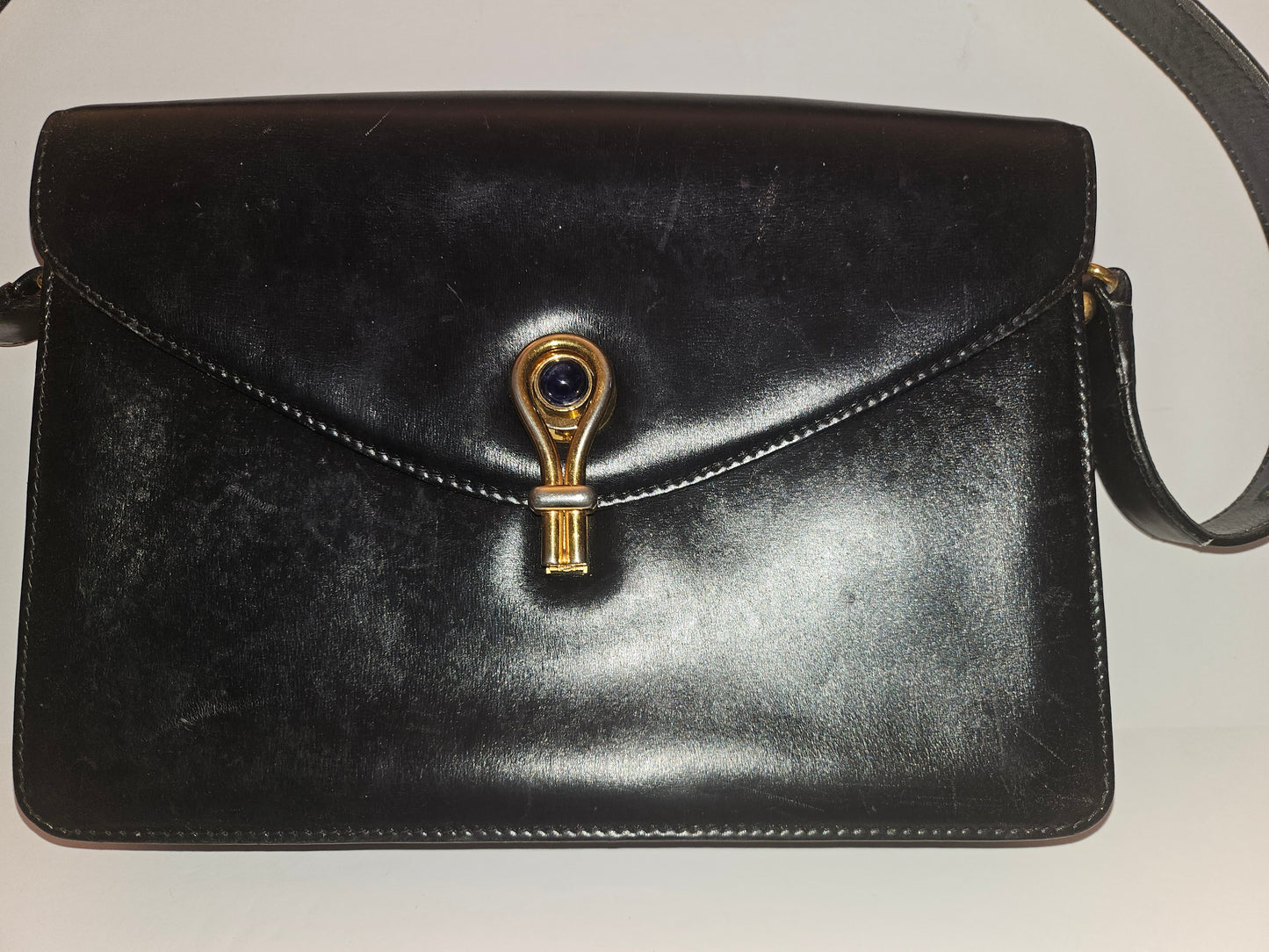 Gucci black leather two way purse with blue lapis clasp