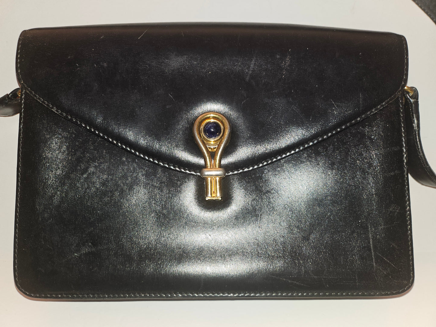Gucci black leather two way purse with blue lapis clasp