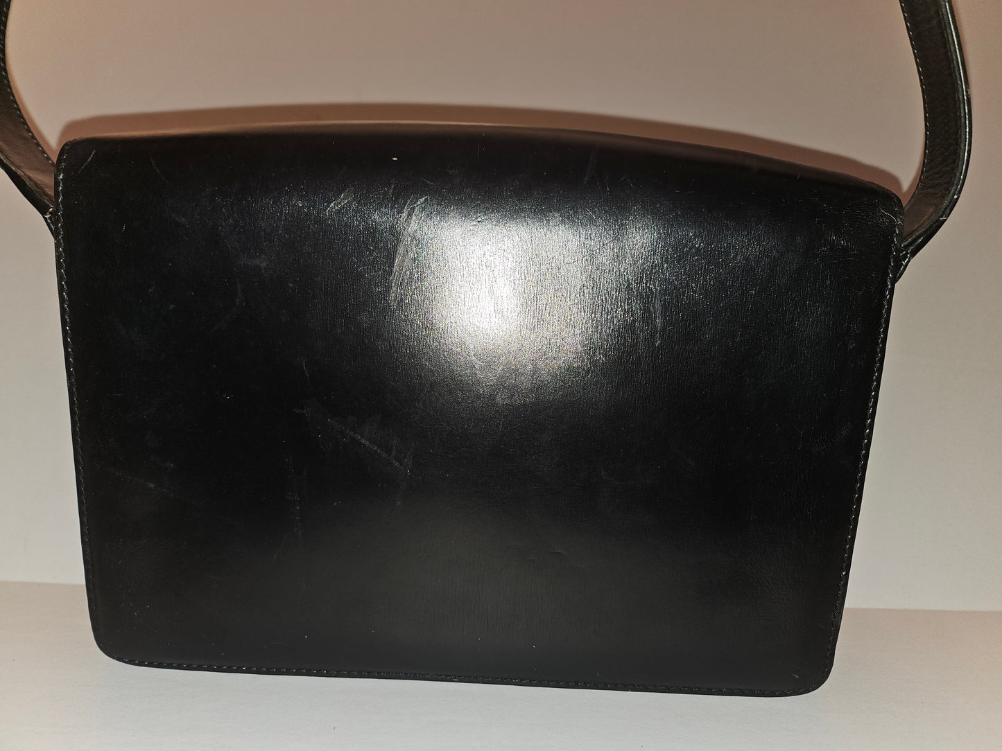 Gucci black leather two way purse with blue lapis clasp