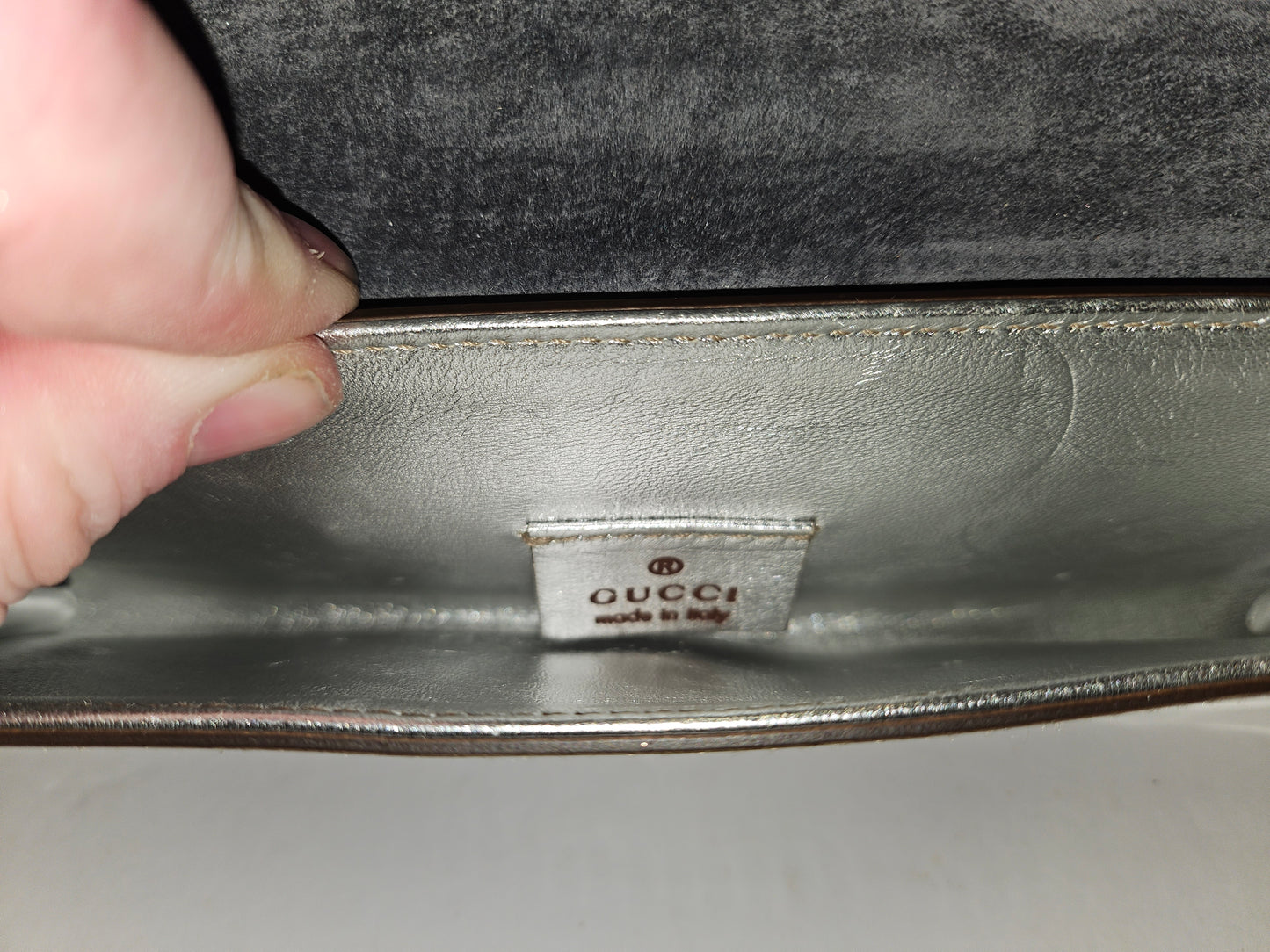 Gucci silver leather clutch with Lucite & chrome accents!