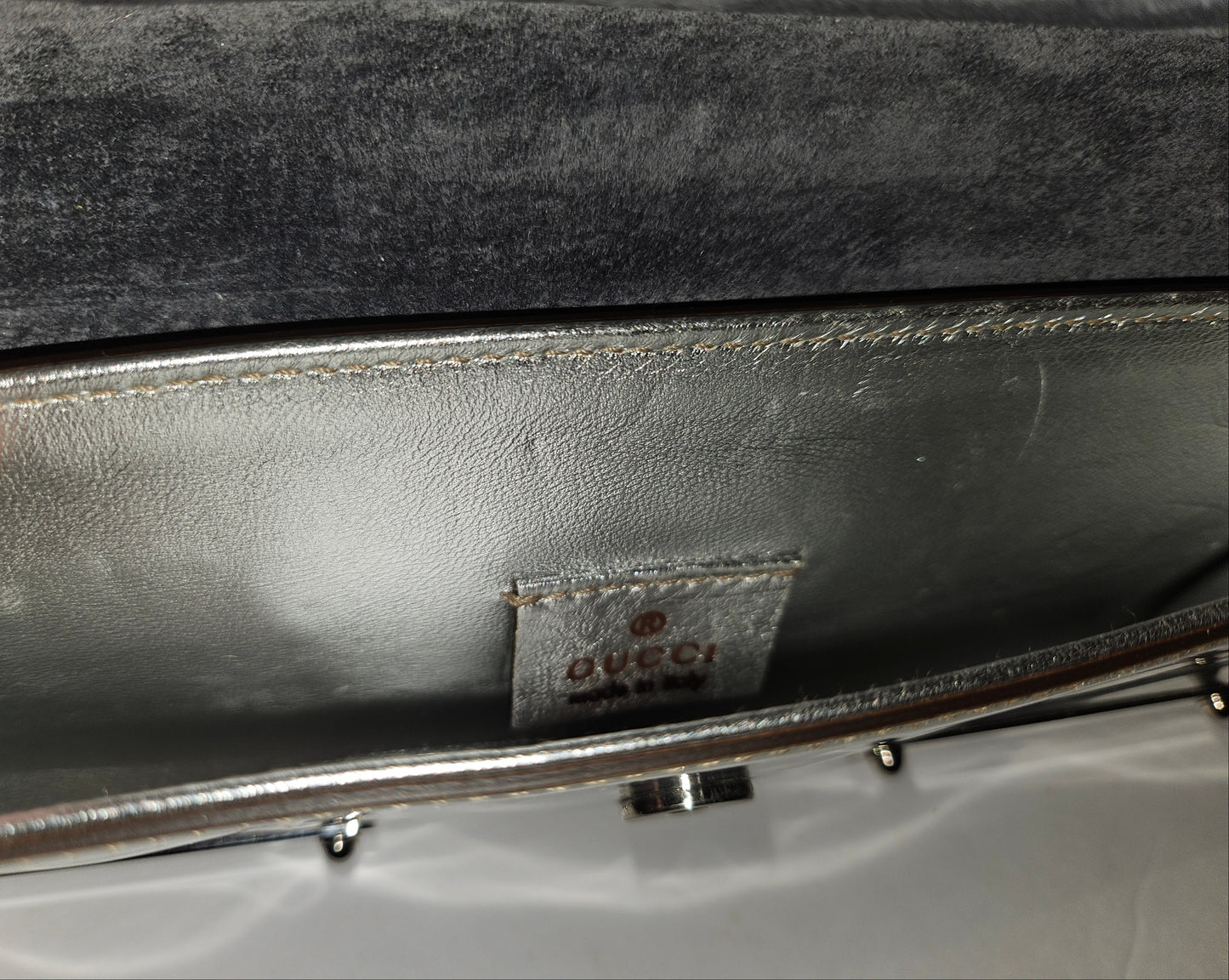 Gucci silver leather clutch with Lucite & chrome accents!