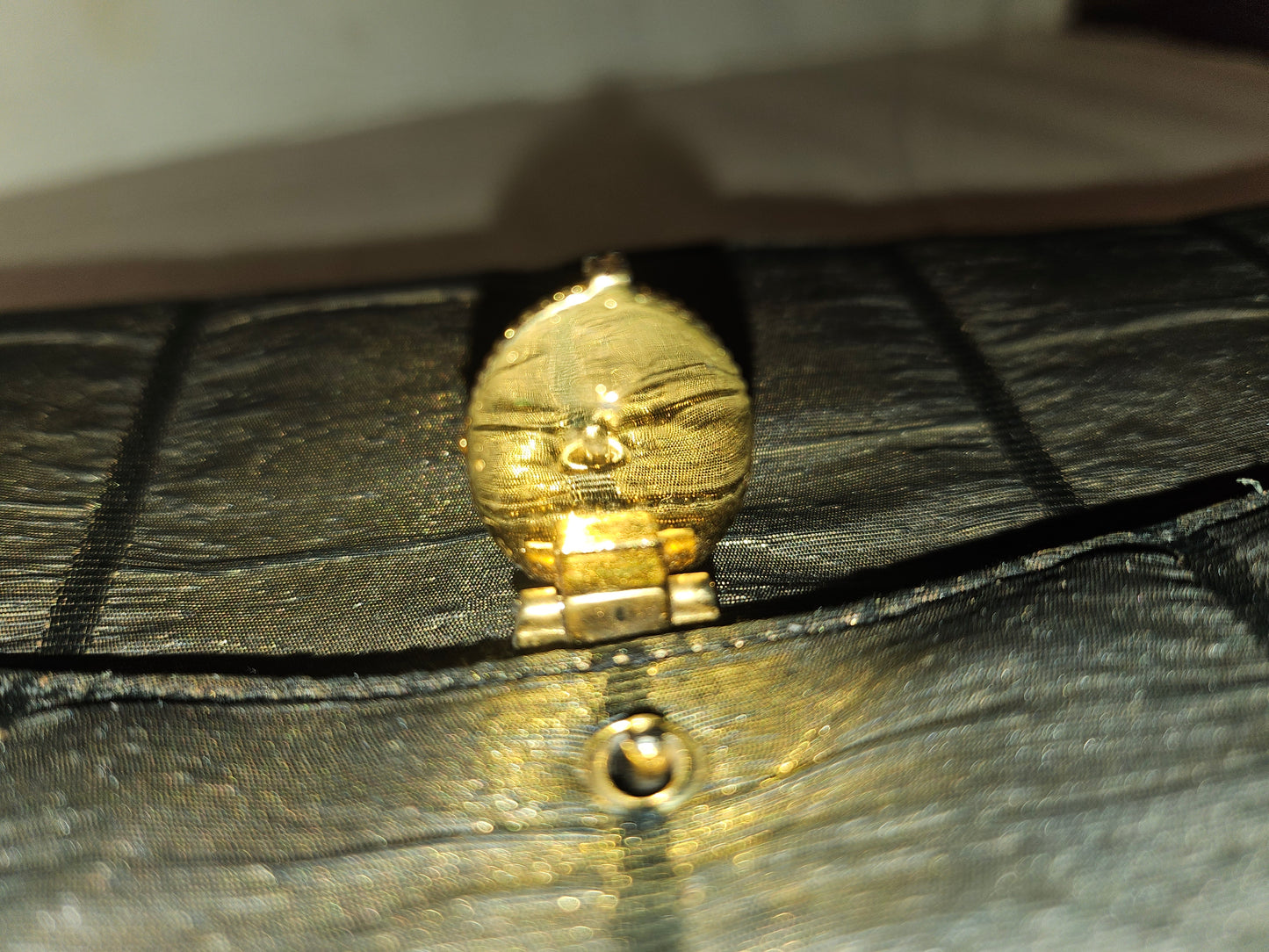 Gucci early black & gold silk taffeta with tiger's eye in 14K clasp