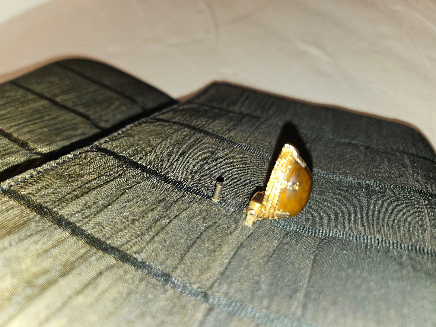Gucci early black & gold silk taffeta with tiger's eye in 14K clasp