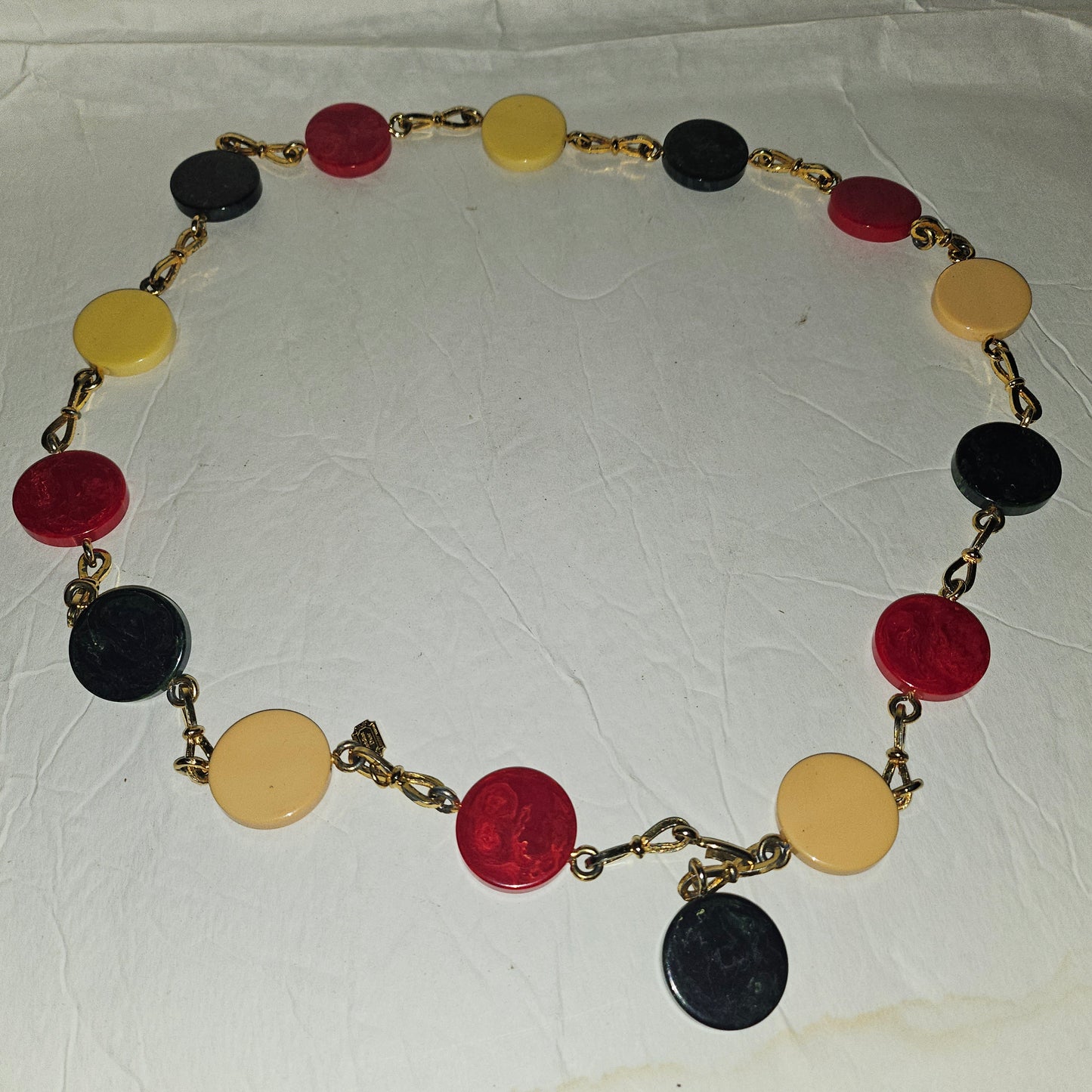 Dior early Bakelite disc chain belt in red, ivory, & blue