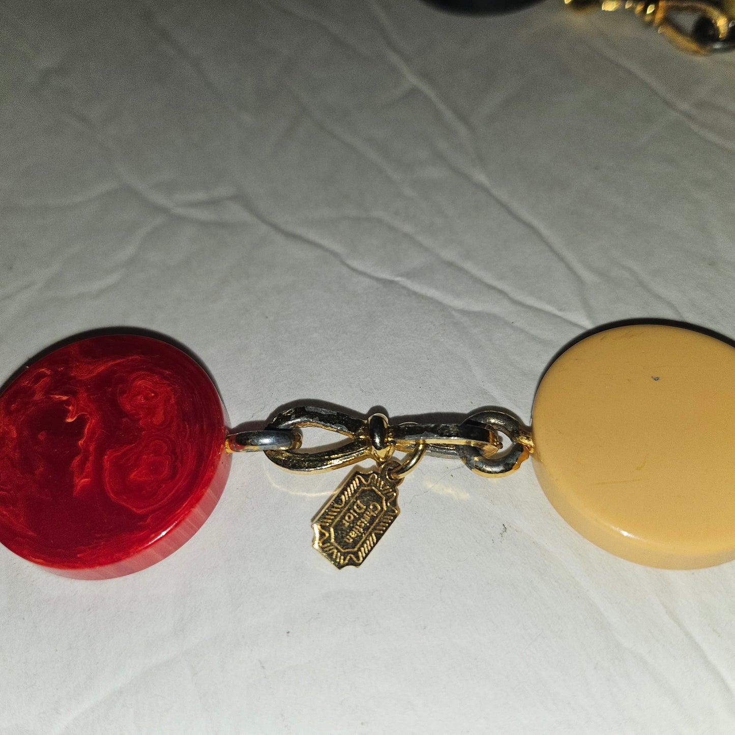 Dior early Bakelite disc chain belt in red, ivory, & blue