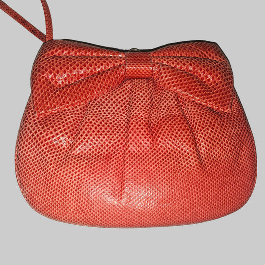 Judith Lieber unique red reptile skin leather two-way bag with a bow accent & rose quartz & ruby cabochon clasp