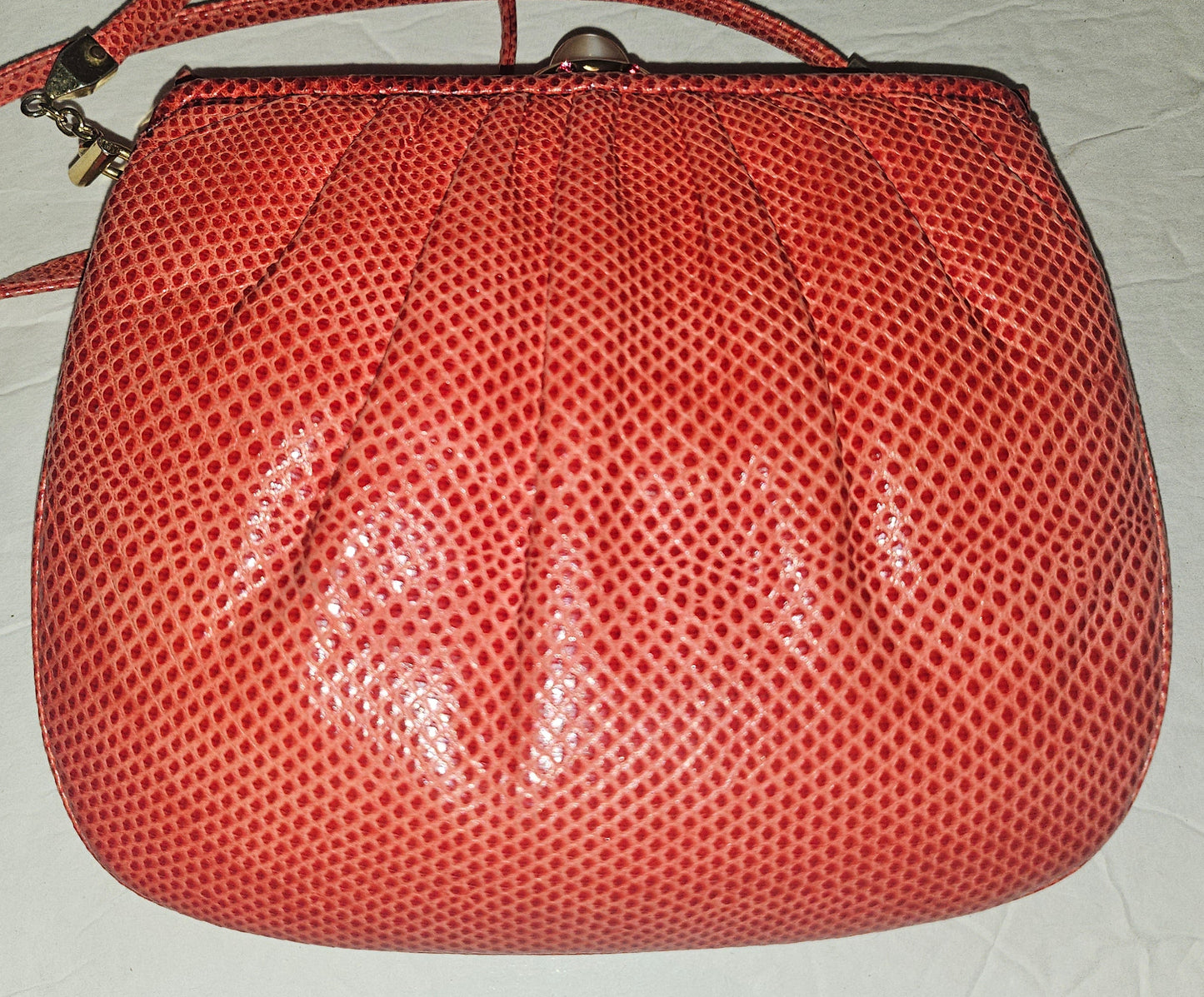 Judith Lieber unique red reptile skin leather two-way bag with a bow accent & rose quartz & ruby cabochon clasp