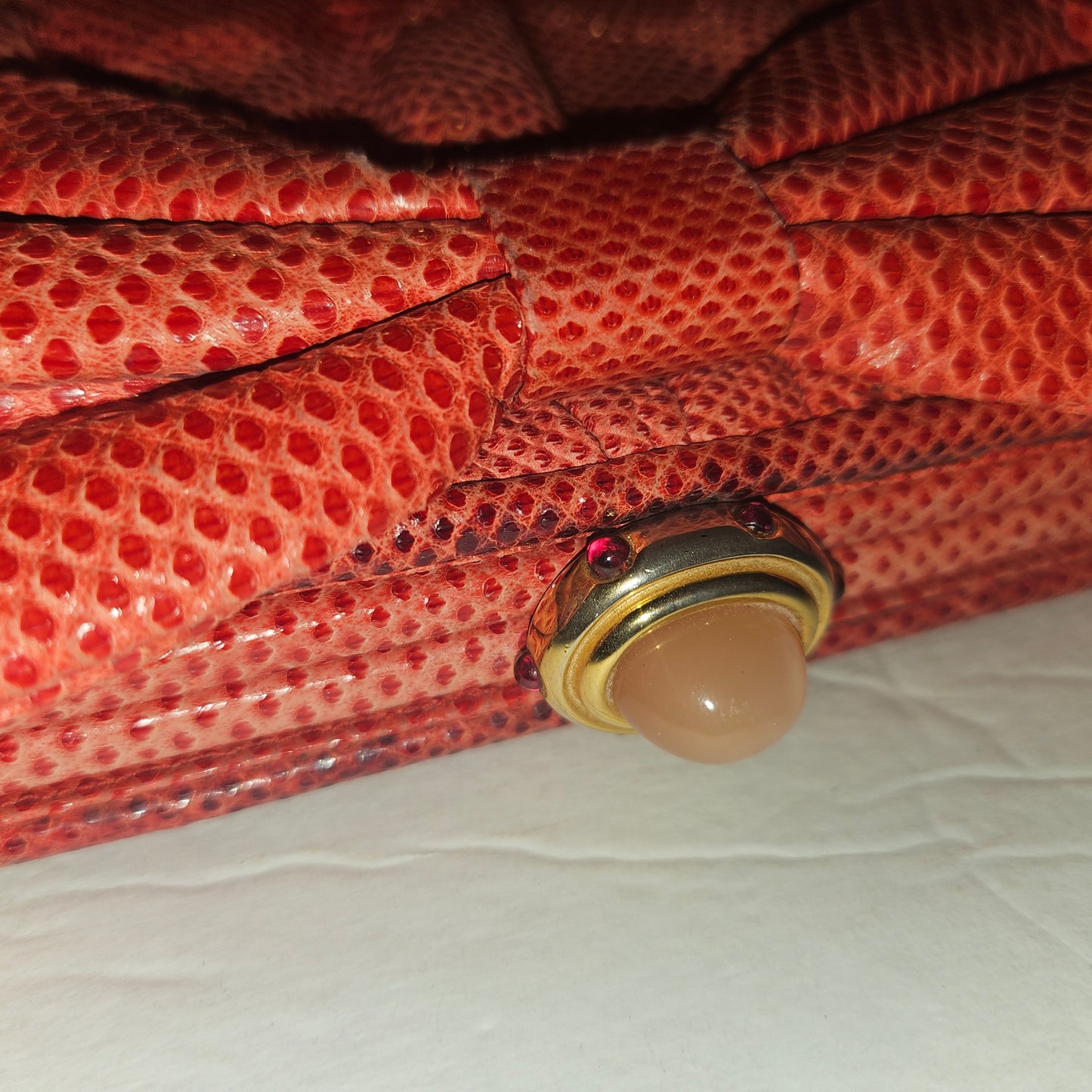 Judith Lieber unique red reptile skin leather two-way bag with a bow accent & rose quartz & ruby cabochon clasp