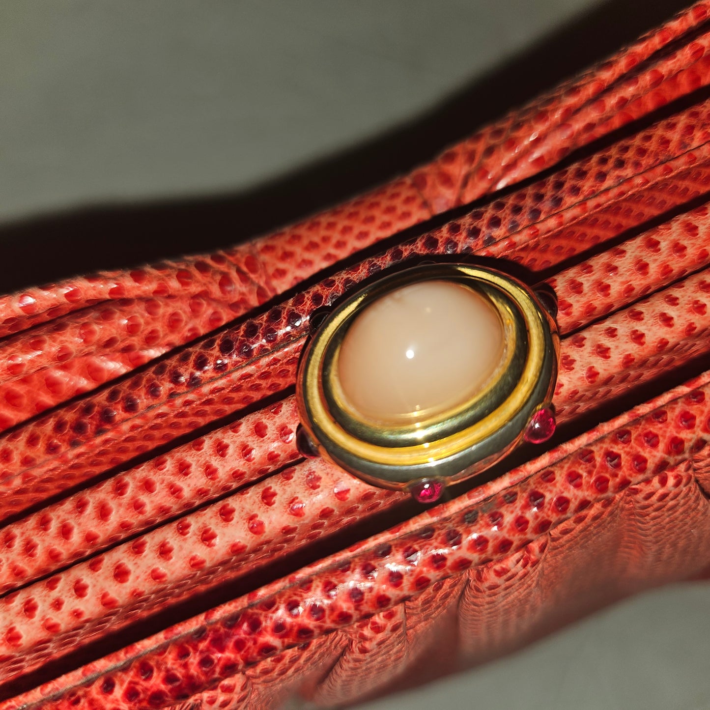Judith Lieber unique red reptile skin leather two-way bag with a bow accent & rose quartz & ruby cabochon clasp