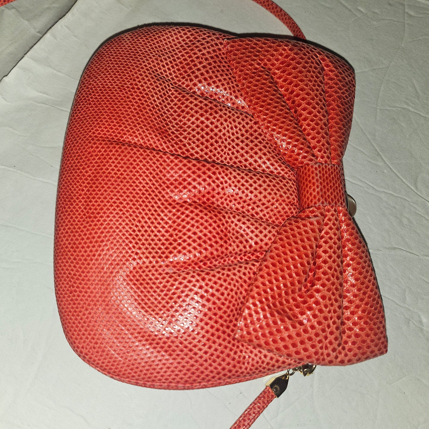 Judith Lieber unique red reptile skin leather two-way bag with a bow accent & rose quartz & ruby cabochon clasp