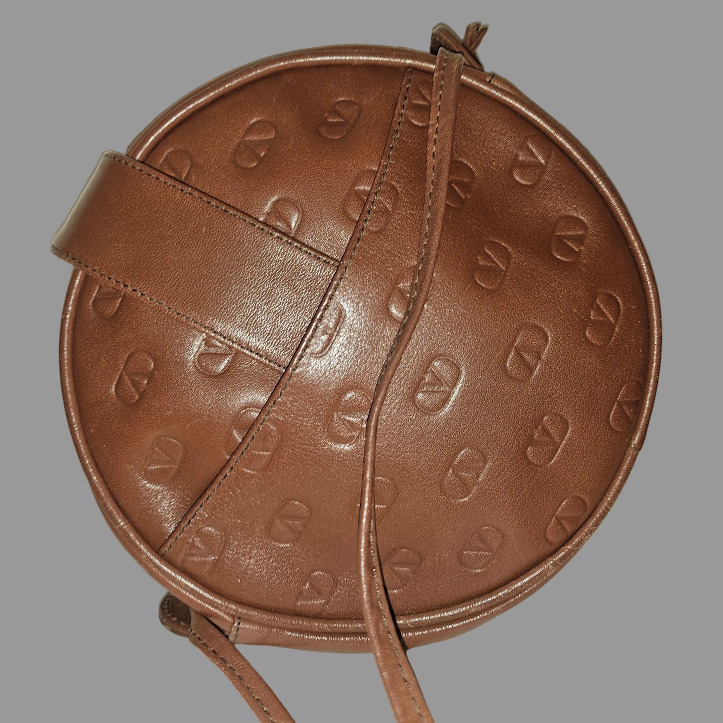 Valentino brown leather round canteen style bag w logo embossed