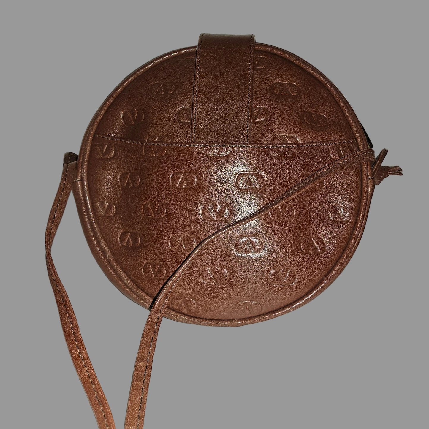 Valentino brown leather round canteen style bag w logo embossed