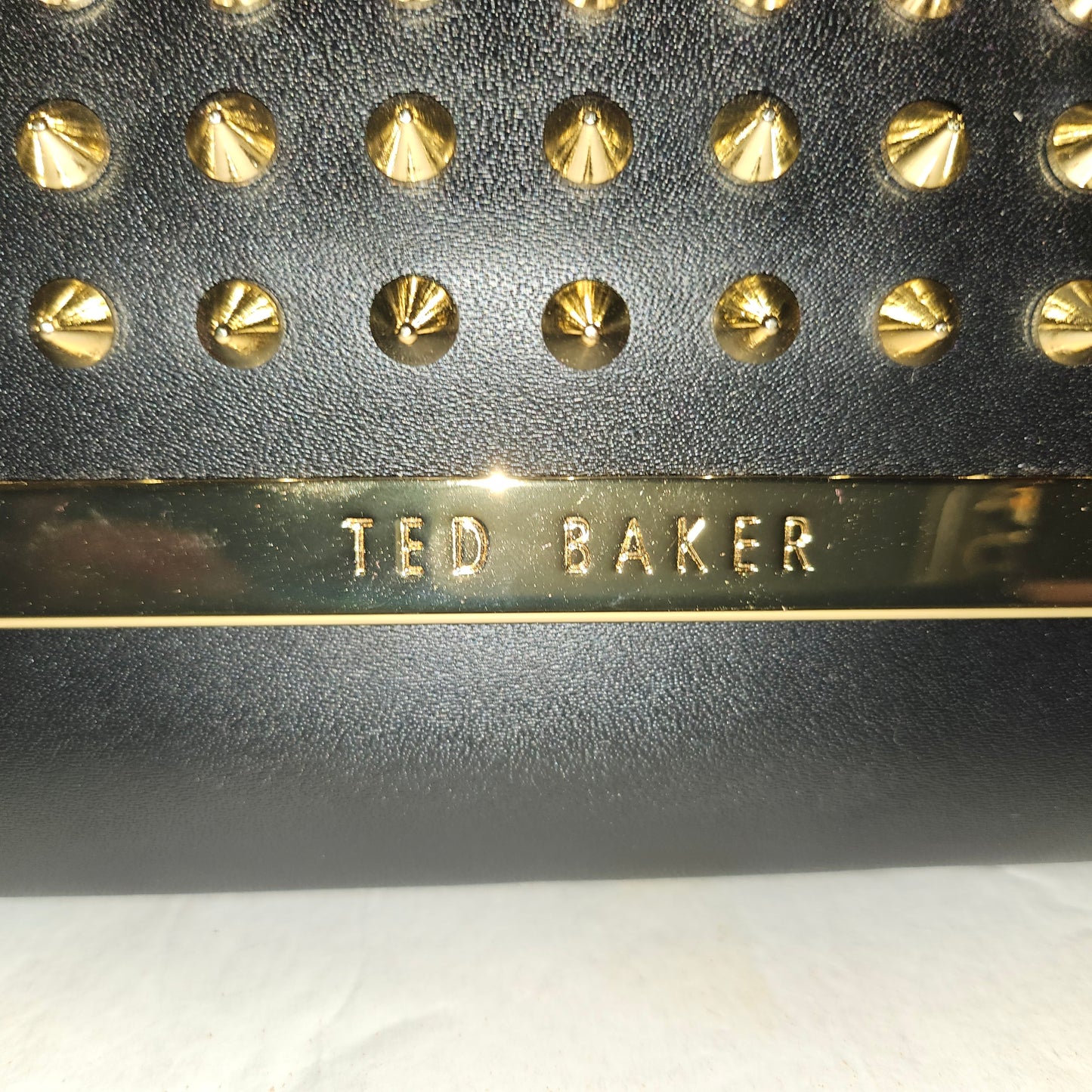 Ted Baker NWT black leather clutch with gold studded spiky hardware