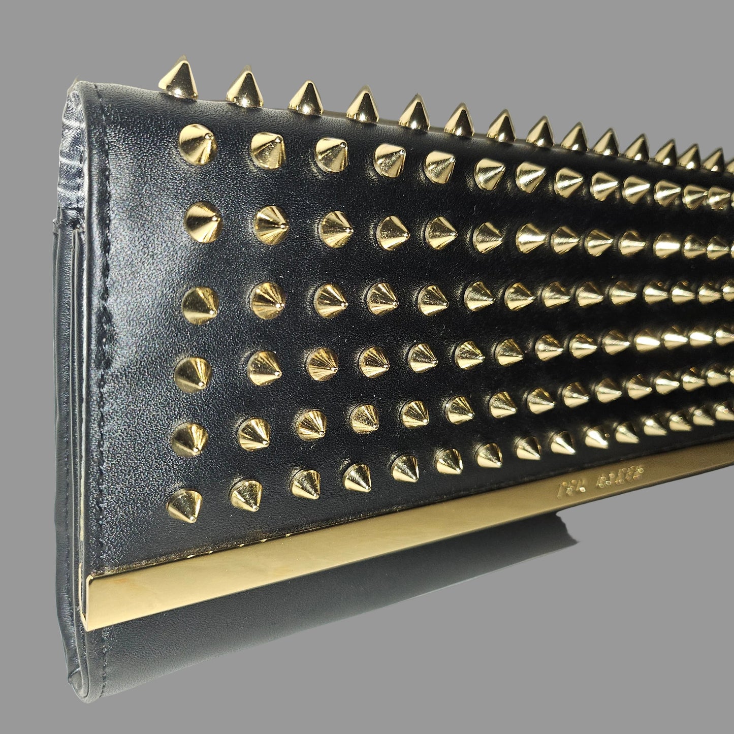 Ted Baker NWT black leather clutch with gold studded spiky hardware